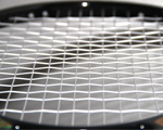 The string pattern of a tennis racquet