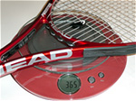The weight of a tennis racquet